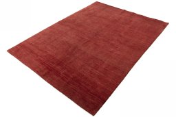 Corner detail of New Persian Gabbeh rug showing border pattern and Wool pile