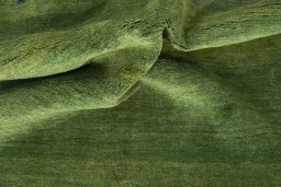 Corner detail of New Persian Gabbeh rug showing border pattern and Wool pile