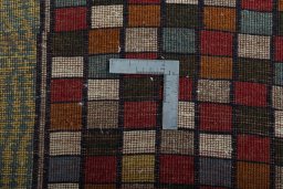 Close-up detail of 2000s Persian Gabbeh rug from Iran / Persia showing Wool weave