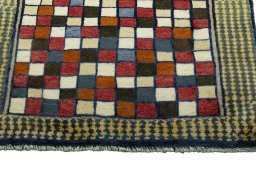 Central medallion detail of 2000s Persian Gabbeh rug from Iran / Persia