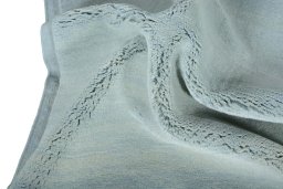 Corner detail of New Persian Gabbeh rug showing border pattern and Wool pile