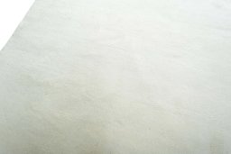 Backside of handmade New Persian Gabbeh rug showing knot structure and weave density