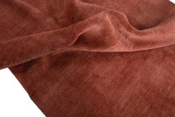 Corner detail of New Persian Gabbeh rug showing border pattern and Wool pile