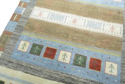 Backside of handmade New Persian Gabbeh rug showing knot structure and weave density