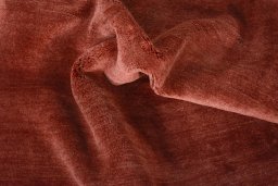 Corner detail of New Persian Gabbeh rug showing border pattern and Wool pile