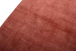 Backside of handmade New Persian Gabbeh rug showing knot structure and weave density