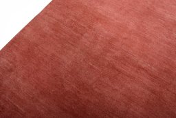 Backside of handmade New Persian Gabbeh rug showing knot structure and weave density