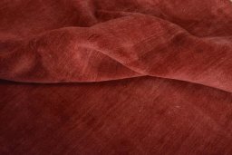 Corner detail of New Persian Gabbeh rug showing border pattern and Wool pile