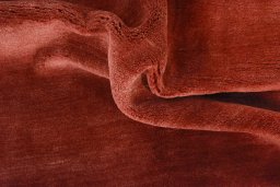 Corner detail of New Persian Gabbeh rug showing border pattern and Wool pile