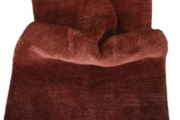 Corner detail of New Persian Gabbeh rug showing border pattern and Wool pile