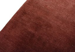 Backside of handmade New Persian Gabbeh rug showing knot structure and weave density