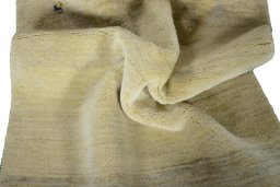 Corner detail of New Persian Gabbeh rug showing border pattern and Wool pile