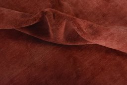 Corner detail of New Persian Gabbeh rug showing border pattern and Wool pile