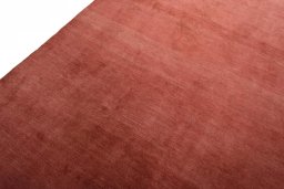 Backside of handmade New Persian Gabbeh rug showing knot structure and weave density