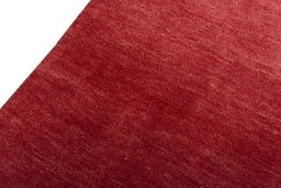 Backside of handmade New Persian Gabbeh rug showing knot structure and weave density