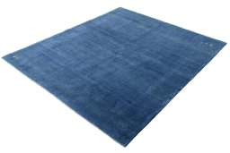 Corner detail of New Persian Gabbeh rug showing border pattern and Wool pile
