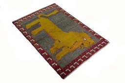 Close-up detail of 2000s Persian Gabbeh rug from Iran / Persia showing Wool weave