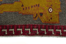 Central medallion detail of 2000s Persian Gabbeh rug from Iran / Persia