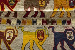 Full view of 2000s Persian Gabbeh rug from Iran / Persia, 180 × 110 cm in Multi Color tones