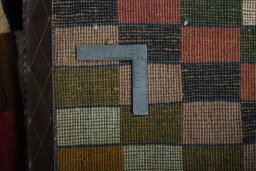 Close-up detail of 2000s Persian Gabbeh rug from Iran / Persia showing Wool weave