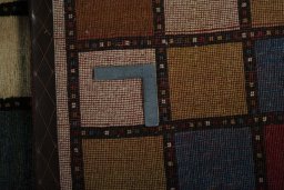 Close-up detail of 2000s Persian Gabbeh rug from Iran / Persia showing Wool weave