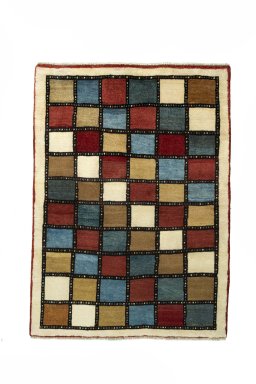 Full view of 2000s Persian Gabbeh rug from Iran / Persia, 143 × 103 cm in Multi Color tones