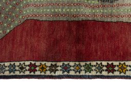 Close-up detail of 2000s Persian Gabbeh rug from Iran / Persia showing Wool weave