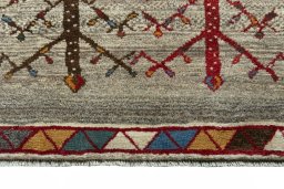 Central medallion detail of 2000s Persian Gabbeh rug from Iran / Persia