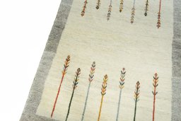Backside of handmade New Persian Gabbeh rug showing knot structure and weave density