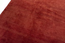 Backside of handmade New Persian Gabbeh rug showing knot structure and weave density