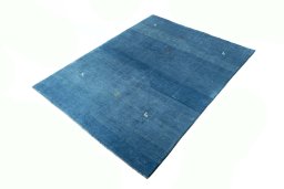 Corner detail of New Persian Gabbeh rug showing border pattern and Wool pile