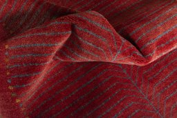 Corner detail of New Persian Gabbeh rug showing border pattern and Wool pile