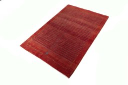 Corner detail of New Persian Gabbeh rug showing border pattern and Wool pile