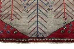 Central medallion detail of 2000s Persian Gabbeh rug from Iran / Persia
