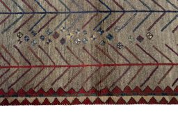Close-up detail of 2000s Persian Gabbeh rug from Iran / Persia showing Wool weave
