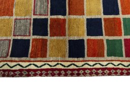 Close-up detail of 2000s Persian Gabbeh rug from Iran / Persia showing Wool weave