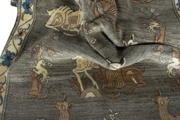 Corner detail of 2000s Persian Gabbeh rug showing border pattern and Wool pile