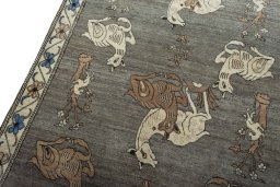Backside of handmade 2000s Persian Gabbeh rug showing knot structure and weave density