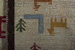 Close-up detail of 2000s Persian Gabbeh rug from Iran / Persia showing Wool weave