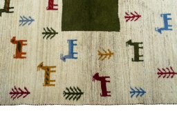 Close-up detail of 2000s Persian Gabbeh rug from Iran / Persia showing Wool weave