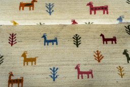 Full view of 2000s Persian Gabbeh rug from Iran / Persia, 200 × 105 cm in Beige tones