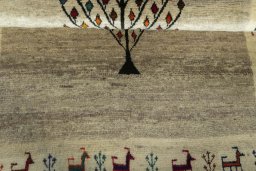 Full view of 2000s Persian Gabbeh rug from Iran / Persia, 150 × 101 cm in Beige tones