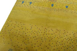 Backside of handmade New Persian Gabbeh rug showing knot structure and weave density