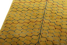 Backside of handmade New Persian Gabbeh rug showing knot structure and weave density