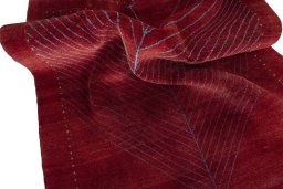 Corner detail of New Persian Gabbeh rug showing border pattern and Wool pile