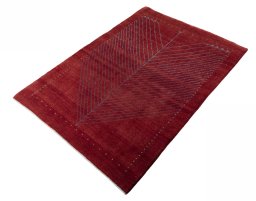 Corner detail of New Persian Gabbeh rug showing border pattern and Wool pile