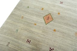 Backside of handmade New Persian Gabbeh rug showing knot structure and weave density