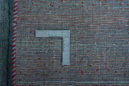 Close-up detail of New Persian Gabbeh rug from Iran / Persia showing Wool weave