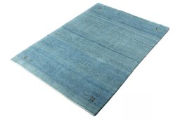 Corner detail of New Persian Gabbeh rug showing border pattern and Wool pile