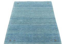 Surface texture of New Persian Gabbeh rug with natural Wool and intricate pattern
